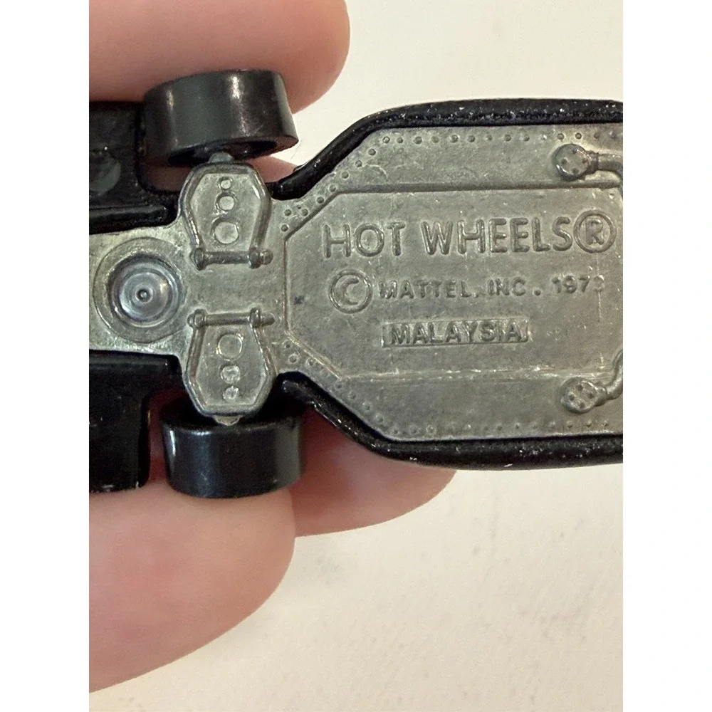 1982 Hot Wheels Malibu Grand Prix 1973 Malaysia Blackwalls Metal Base Black #1